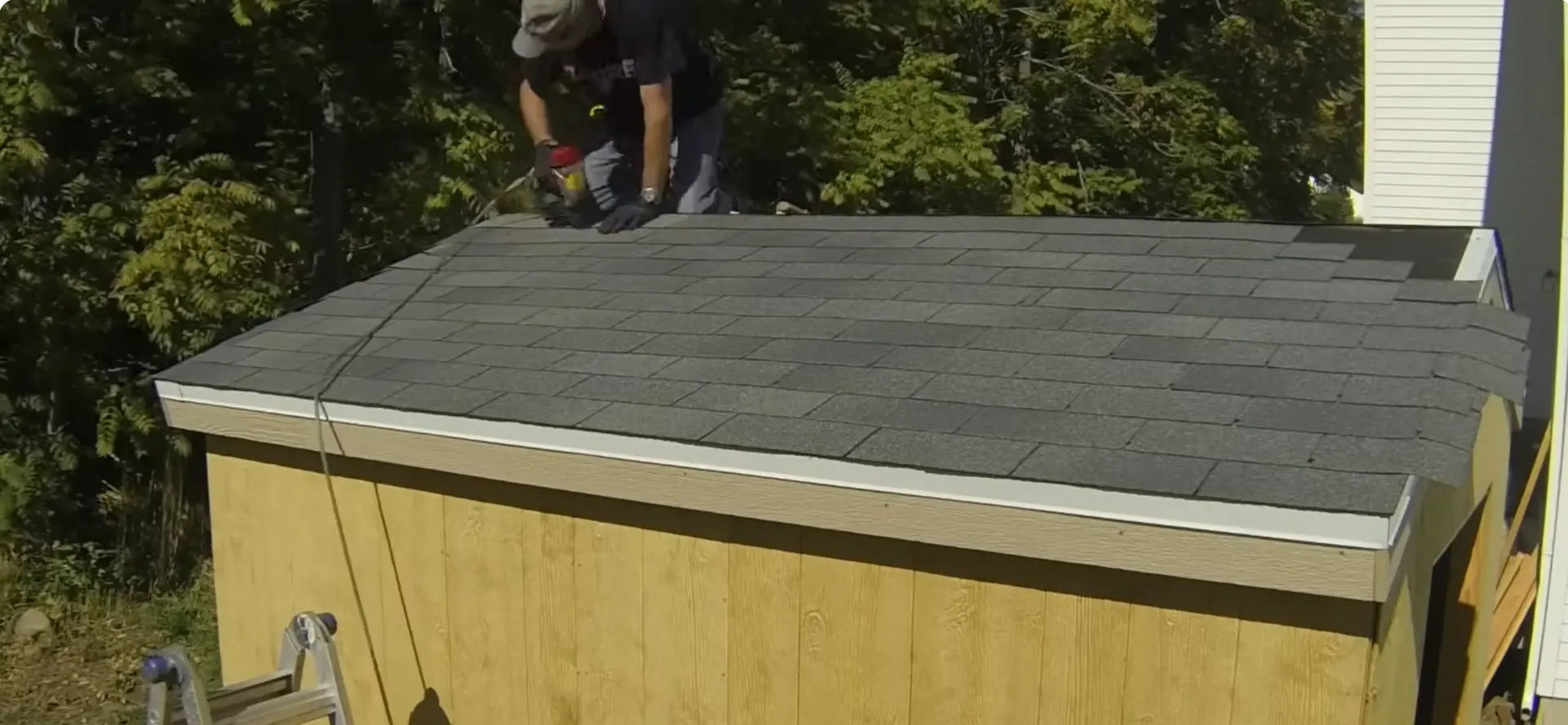 After: Beautiful new dark grey shingles installed by a trusted Bismarck Roofing Company.